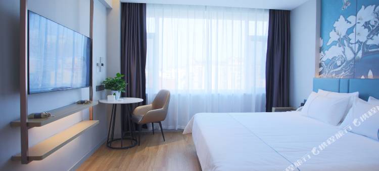 白玉兰酒店(威海高铁站韩乐坊店)图片