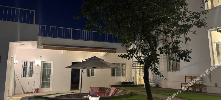 木姐家民宿(水磨沟区北山坡店)图片