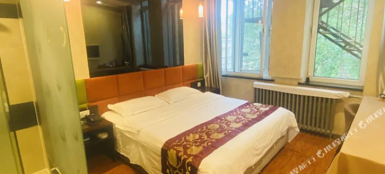 七彩时尚艺术宾馆(哈尔滨师范大学店)图片