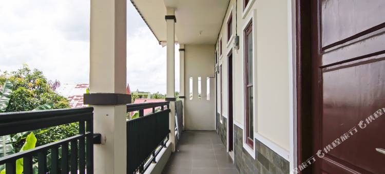 O酒店普特里伊斯兰旅馆靠近SPBU林博潘长(Hotel O Putri Guest House Syariah Near Spbu Rimbo Panjang)图片