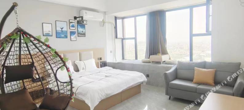 仟客观影酒店(巩义正上豪布斯卡店)图片