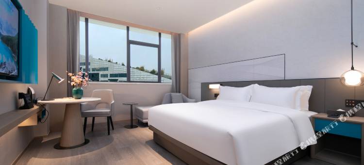 万信至格酒店(武汉天河机场航空总部地铁站店)图片