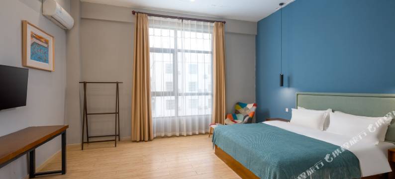 喜上花田设计酒店(海口美兰机场店)图片