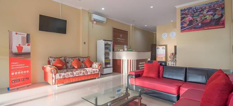 红多兹Plus酒店-近沙姆斯丁努尔机场3号(RedDoorz Plus Near Syamsudin Noor Airport 3)图片