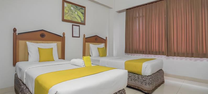 耶赫兹基尔苏拉帕西米特拉红门酒店(Hotel Yehezkiel Surapati Mitra RedDoorz)图片