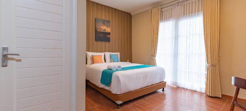 桑斯维布斯苏拉帕西孔福塔酒店(Sans Vibes Surapati Konforta Hotel)图片
