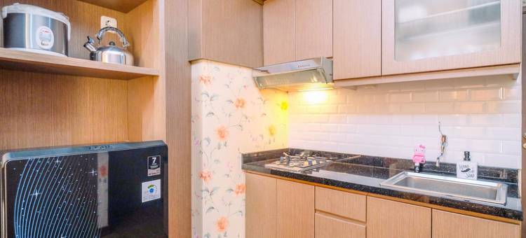 Homey and Modern 2BR at Podomoro Golf View Apartment By Travelio图片