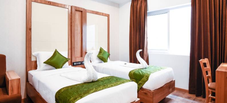 Treebo Vinayak 旅馆(Treebo Vinayak Inn, 600 MTS from Coimbatore Railway Station)图片