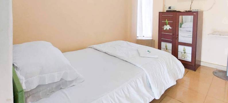 夸特里克迪民宿米特拉红门酒店(Quattrick Dee Homestay Mitra RedDoorz)图片