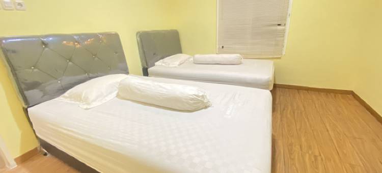 RN民宿-近竹子广场波勒瓦利-米特拉红门酒店(Homestay RN Near Taman Bambu Runcing Polewali Mitra RedDoorz)图片