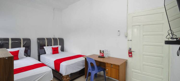 红门酒店Syariah尼尔斯塔修恩克雷塔阿皮基萨兰(RedDoorz Syariah Near Stasiun Kereta Api Kisaran)图片