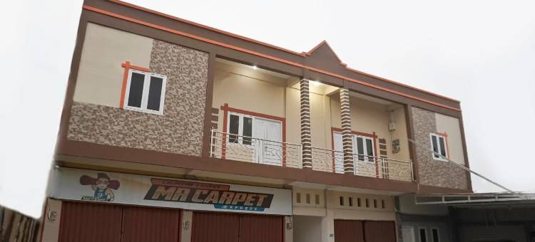 OYO1539阿姆里客房酒店(RedDoorz Syariah Near Sultan Syarif Kasim II Airport)图片