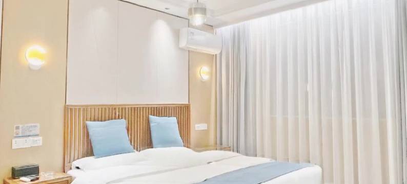 美宜家连锁酒店(镇平店)图片