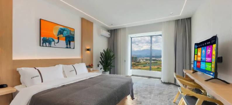 西双版纳景洪逸格智能酒店(曼听公园店)图片