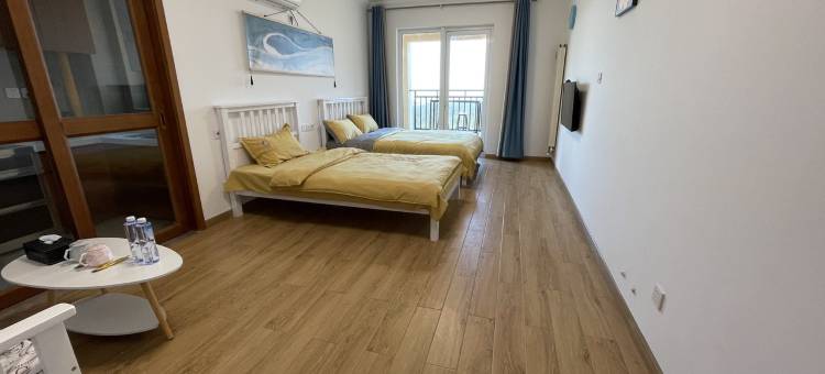 森海旅居刘经理公寓(闻涛路分店)图片