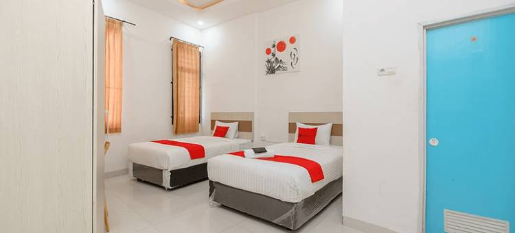 瑞德多兹酒店 - 近巨港贸易中心(RedDoorz at Tara Homestay Palembang)图片