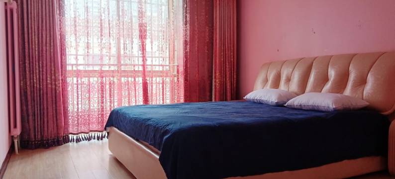 唐岛湾临近金沙滩啤酒城温馨民宿(珠江路分店)图片