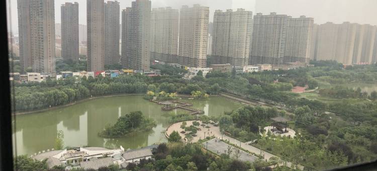 龙门石窟高铁站开元湖音乐喷泉公寓(兴洛西街1号分店)图片
