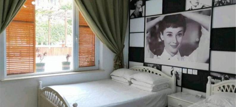 獐岛遇浪漫度假暖舍特色民宿(獐岛村分店)图片