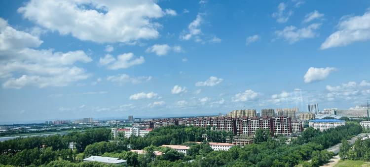 万兴公寓万达附近空调大床房技师学院(万达路分店)图片