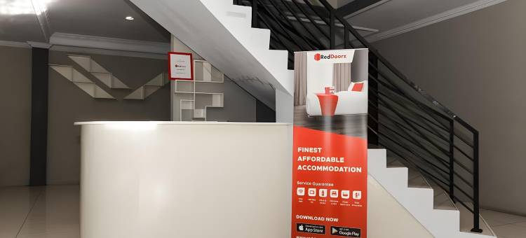 红多兹Plus酒店-近万鸦老凯拉吉杜亚特兰斯超市(RedDoorz Plus Near Transmart Kairagi Dua Manado)图片