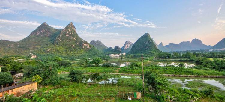 找稻田・喜看稻菽|自在方外・270°环山观景度假美宿(芦笛景区店)图片
