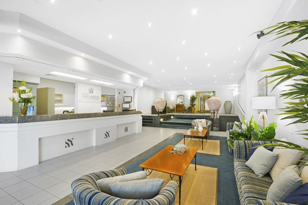 Surfers Aquarius on the Beach Over view