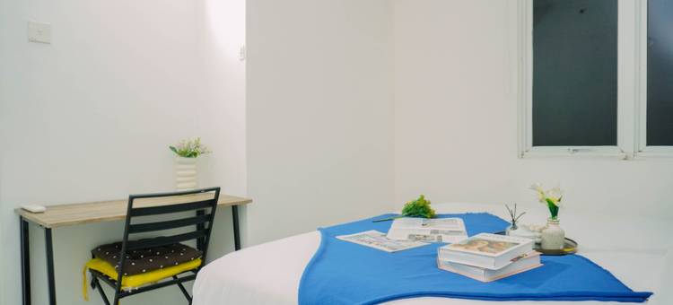 Gray Accent 1BR at Grand Sentraland Karawang Apartment By Travelio图片