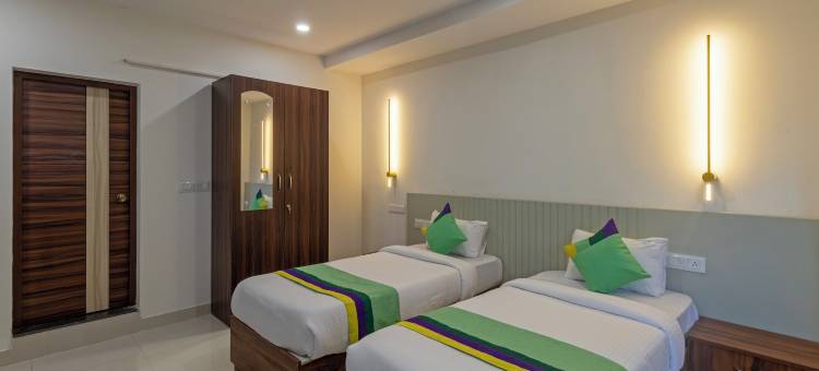 Treebo 拉加文德拉宁静客栈贝兰杜尔(Treebo Raghavendra Tranquil Inn Bellandur)图片