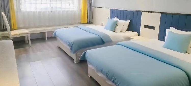 OYO雪峰宾馆(广元万达澳源体育中心店)图片