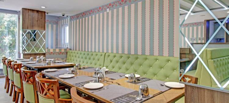 Treebo 乌莎瓦西维阿利皮里路，距离提鲁帕提中央公交车站2公里(Treebo Usha Vasavi Alipiri Road, 2 Km from Tirupati Central Bus Station)图片