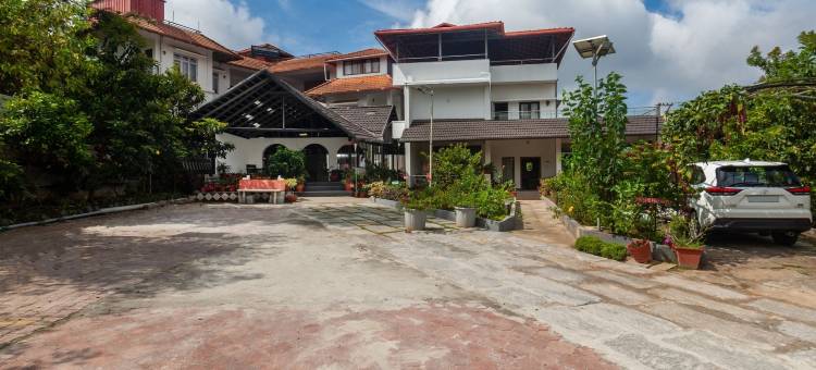 Treebo Vrindavan，距离Madikeri堡垒3公里(Treebo Vrindavan, 3 Km from Madikeri Fort)图片