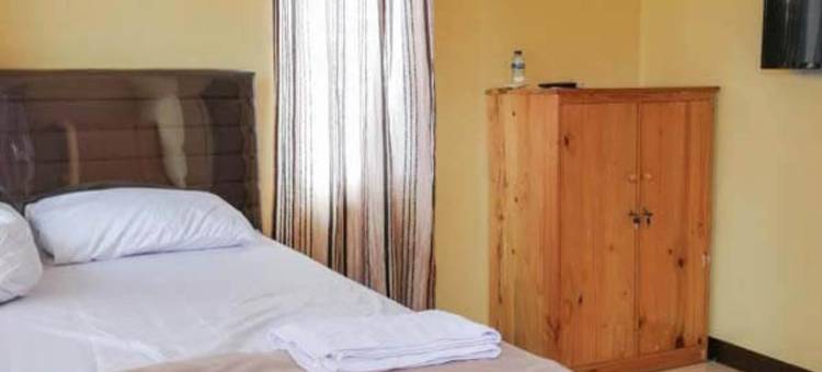 里斯奇亚清真TOD M1苏加诺哈达机场米特拉红门酒店(Risqia Syariah Tod M1 Bandara Soekarno Hatta Mitra RedDoorz)图片