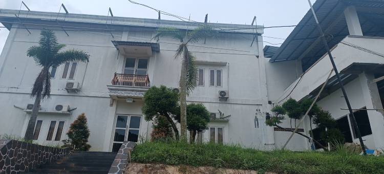 Hotel O 翁布伊民宿靠近哈吉伊鲁斯的坎丹甘粽子店(OYO 93512 Umbuy Homestay NearKetupat Kandangan Haji Irus)图片