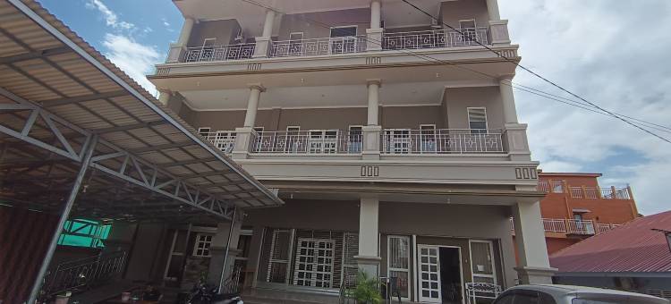 O酒店彭多克普蒂莎蒂卡伊斯兰旅馆靠近朱马特市场阿鲁阿鲁(Hotel O Pondok Puti Sartika SyariahNearPasar Jum'at Aluh Aluh)图片