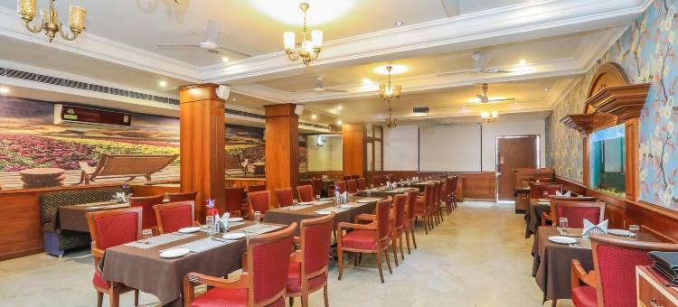 Treebo Komfort 套房酒店，距离迈索尔皇宫3公里(Treebo Komfort Suites, 3 Km from Mysore Palace)图片