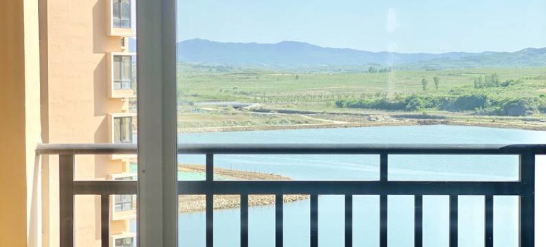 蓝海居小许公寓(闻涛路1号分店)图片