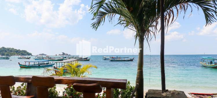 沙哈巴特海滩宾馆 - 米特拉红门酒店(Sahabat Pantai Guest House Mitra RedDoorz)图片