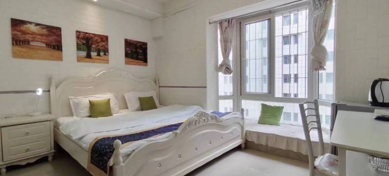 优客江景投影民宿(北区路分店)图片