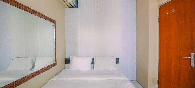 家庭般的紧凑型2BR Cibubur村公寓(Homey and Compact 2Br Cibubur Village Apartment)图片