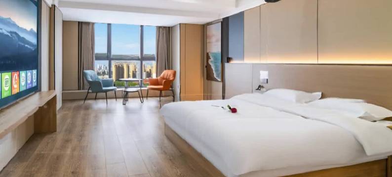 筑梦观影酒店(郑州大学新校区河南工业大学地铁站店)图片