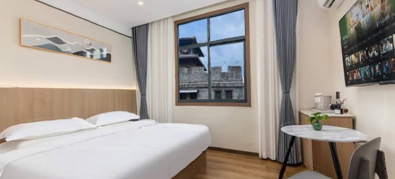 柒零酒店(曹魏古城胖东来时代广场店)图片