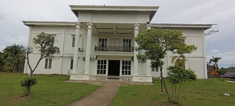 Hotel O 翁布伊民宿靠近哈吉伊鲁斯的坎丹甘粽子店(OYO 93512 Umbuy Homestay NearKetupat Kandangan Haji Irus)图片