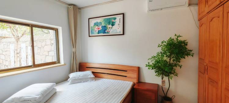云上居海草房特色民宿(福寿路分店)图片