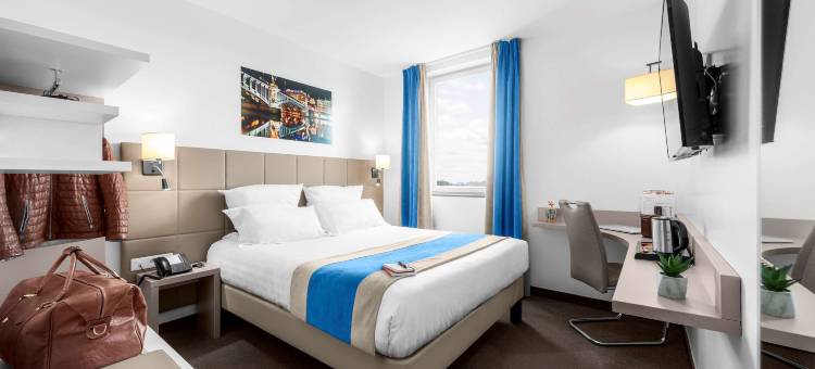 里昂东梅济约厄科尔斯博体育场基里亚德酒店(Kyriad Lyon Est - Stadium - Eurexpo)图片