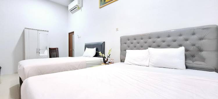 卡里斯玛努山塔拉萨甘米特拉红门酒店(Kharisma Nusantara Homestay Sagan Mitra RedDoorz)图片