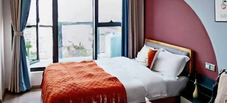 以礼娜姑民宿(云南财经大学龙泉校区万彩城店)图片