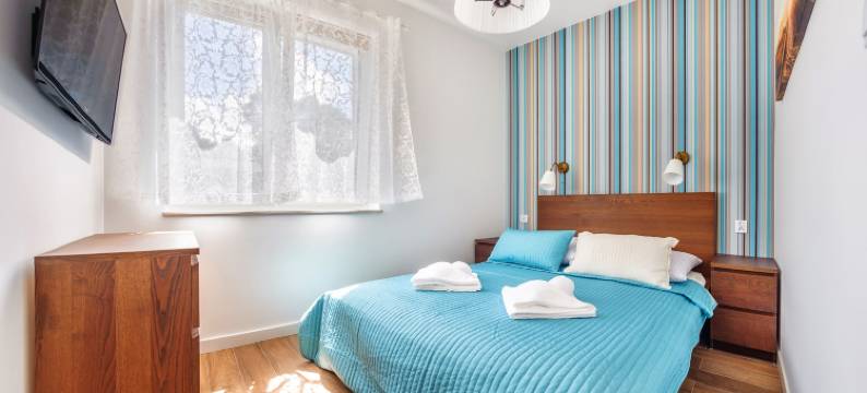 德怀索斯尼阳光和白雪公寓酒店(Dwie Sosny z sauną, Sun & Snow)图片