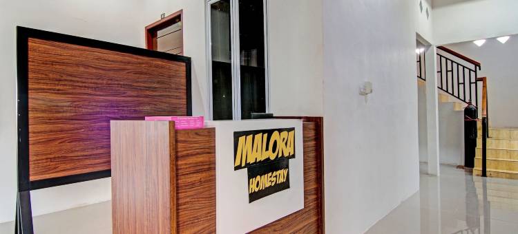 OYO 92081 马洛拉家庭旅馆(RedDoorz Near Parit Indah Pekanbaru)图片