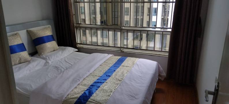 峨山公寓(石烂路分店)图片